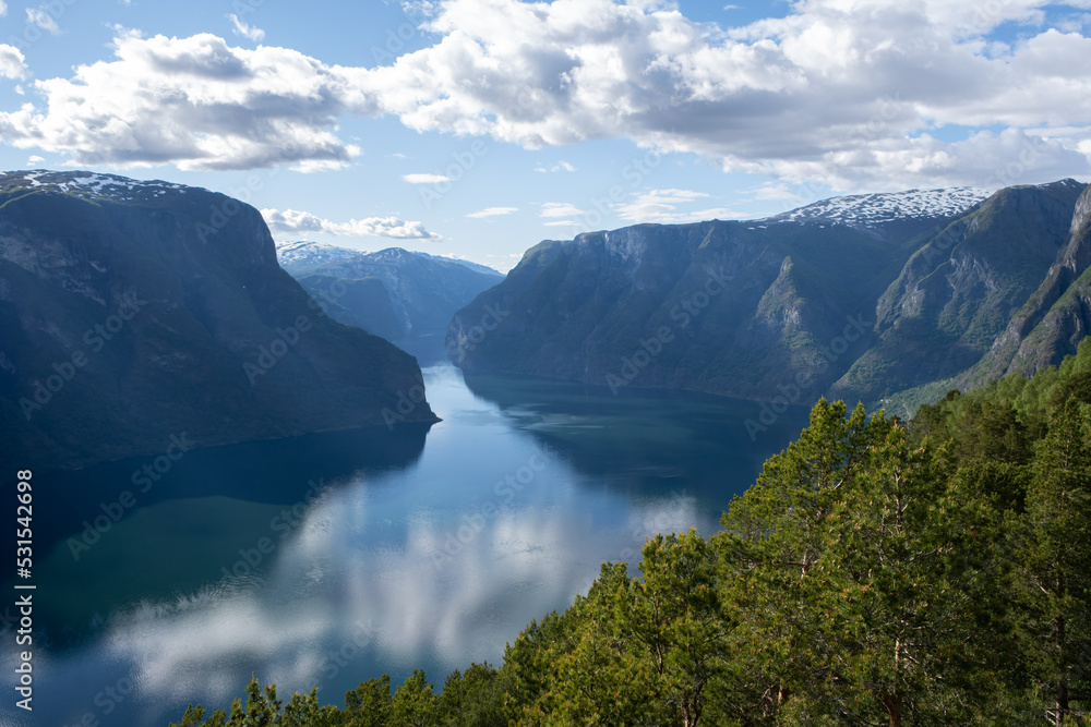 Wonderful landscapes in Norway. Vestland. Beautiful scenery of Aurland fjord from the Stegastein view point facing to the village of Aurland. Sunny day. Selective focus