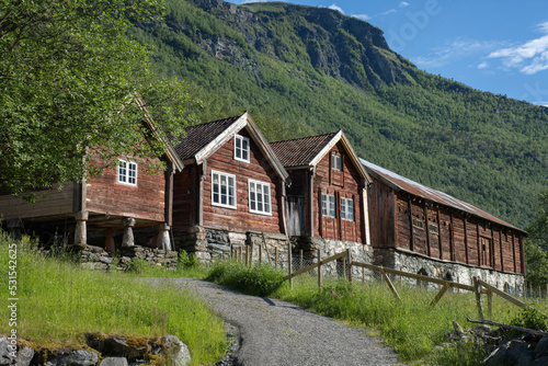 Otternes, Norway - June 19, 2022: Otternes, a Norwegian linear and cluster collective farmyard midway between Aurland and Flam. Vestland county. The farmyard consists of 27 buildings. Selective focus photo