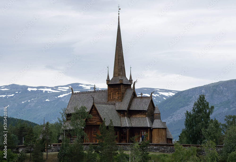 Lom, Norway - June 22, 2022: Lom Stave Church is a parish church of the Church of Norway. In Lom municipality. Innlandet. Sunny spring day. Selective focus