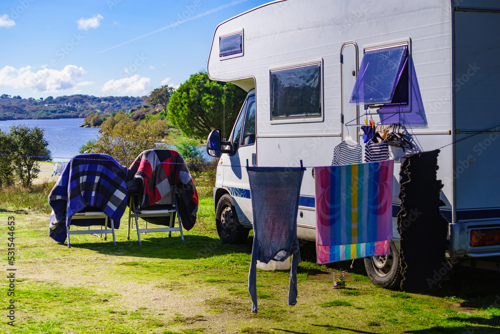 Camping. Clothes hanging to dry by camper rv. Camping. Clothes hanging to dry by camper rv.