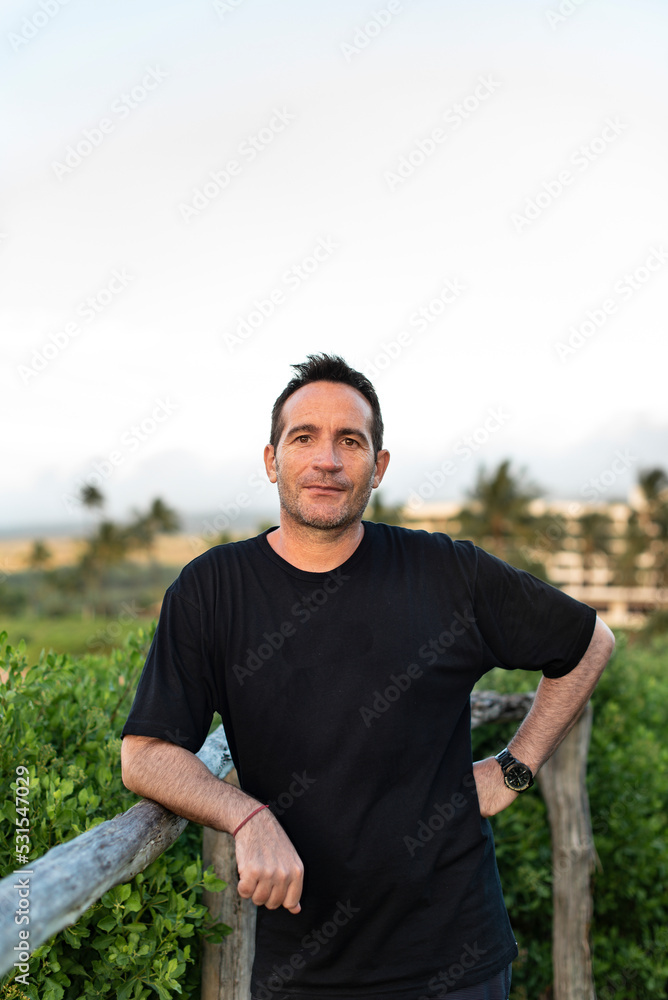 Portrair of handsome man looking at camera in Maui, Hawaii. Copy space. Portrair of handsome man looking at camera in Maui, Hawaii. Copy space.