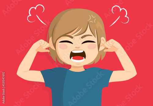 Little boy covering ears shouting and not listening. Naughty child misbehaving concept