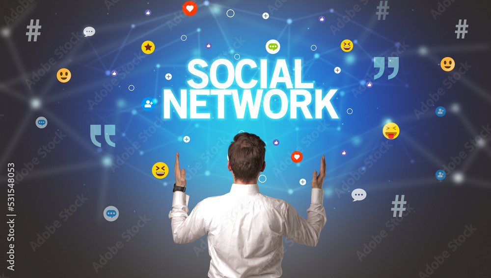 Rear view of a businessman, social media concept Rear view of a businessman, social media concept