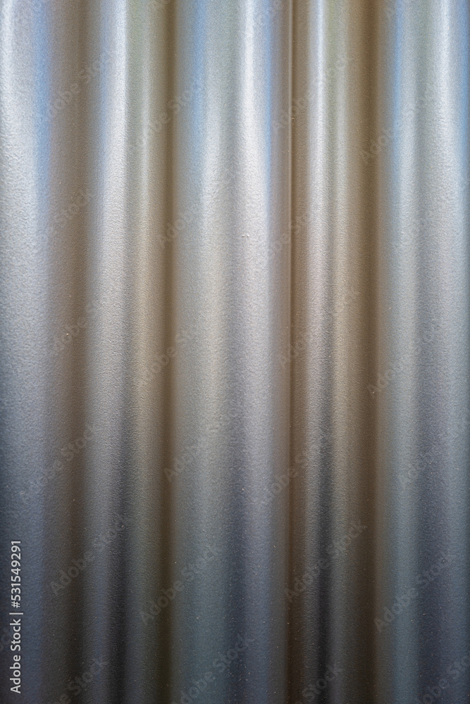 Abstract View of Gold and Silver Satin Curtains for use as a Background. Abstract View of Gold and Silver Satin Curtains for use as a Background.