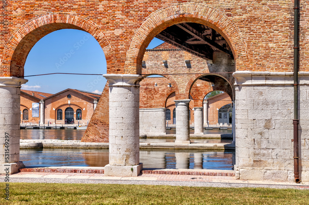 Fototapeta premium Venice, Italy - July 5, 2022: Building exteriors along the canals in Venice Italy 