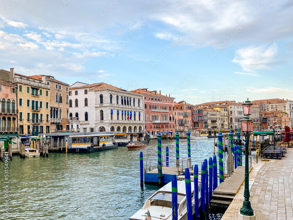 Venice, Italy - July 5, 2022: Building exteriors along the canals in Venice Italy
