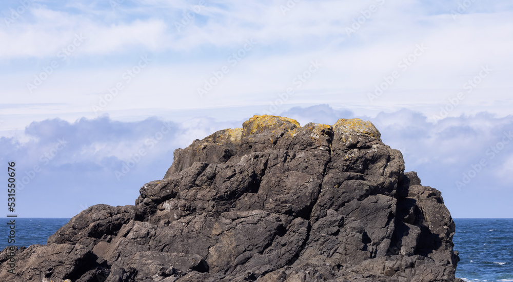 Rugged Rocks on a rocky shore on the West Coast of Pacific Ocean.