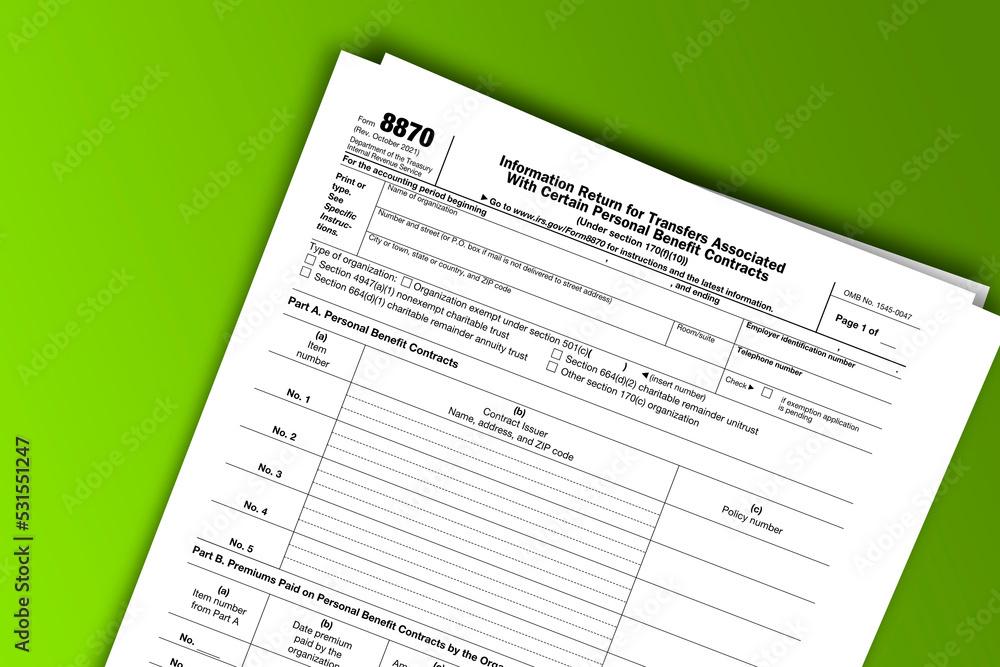 Form 8870 documentation published IRS USA 10.26.2021. American tax document on colored Form 8870 documentation published IRS USA 10.26.2021. American tax document on colored
