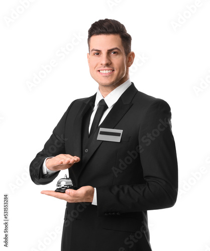 Happy receptionist in uniform holding service bell on white background