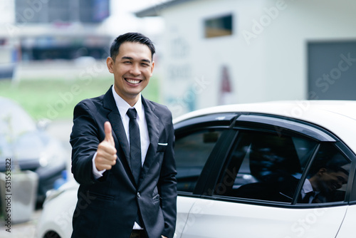 Car dealer man. Auto dealership and rental concept. © PaeGAG