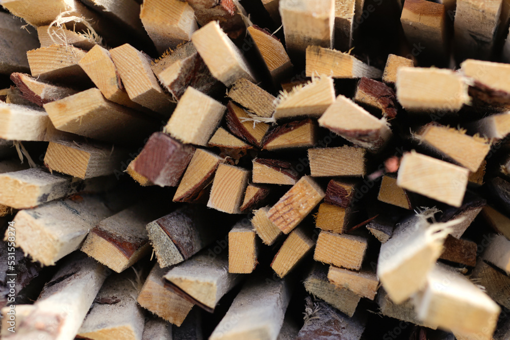 Defocus piles of wooden boards in the sawmill, planking. Warehouse for sawing boards on a sawmill outdoors. Wood timber stack of wooden blanks construction material. Out of focus Defocus piles of wooden boards in the sawmill, planking. Warehouse for sawing boards on a sawmill outdoors. Wood timber stack of wooden blanks construction material. Out of focus