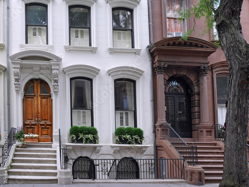 Old fashioned New York townhouses in contrasting colors