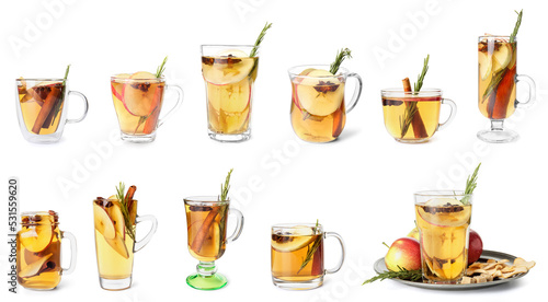 Fotografie Set of delicious mulled wine isolated on white