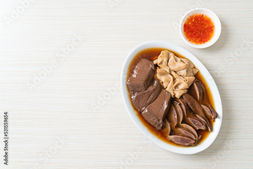 Obraz na plátně stewed duck offal in brown soup