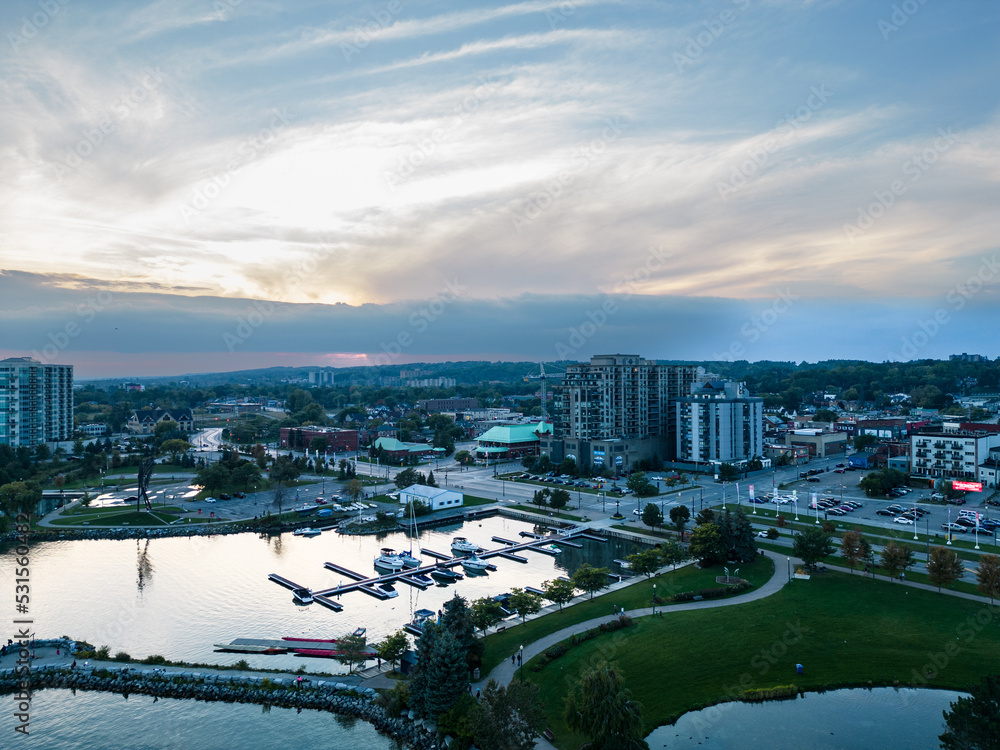 Downtown Barrie Drone shots of park boat yard and buildings at sunset 