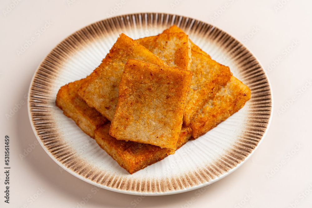 Turnip cake (Chinese Chai tow kway ). Turnip cake is a common dish or
