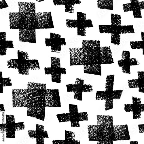 Seamless pattern with charcoal crosses of different sizes. Charcoal sketch of geometrical and math signs. Modern stylish texture with graphite geometrical signs. Black and white pattern with plus sign