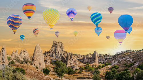 hot air balloon flying over Goreme Open Air Museum in Cappadocia Turkey