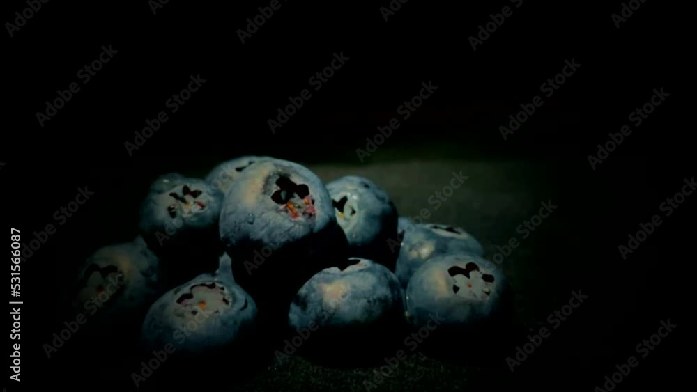 Blueberries on the black background. Closeup hd video. Summer ripe fruits Blueberries on the black background. Closeup hd video. Summer ripe fruits