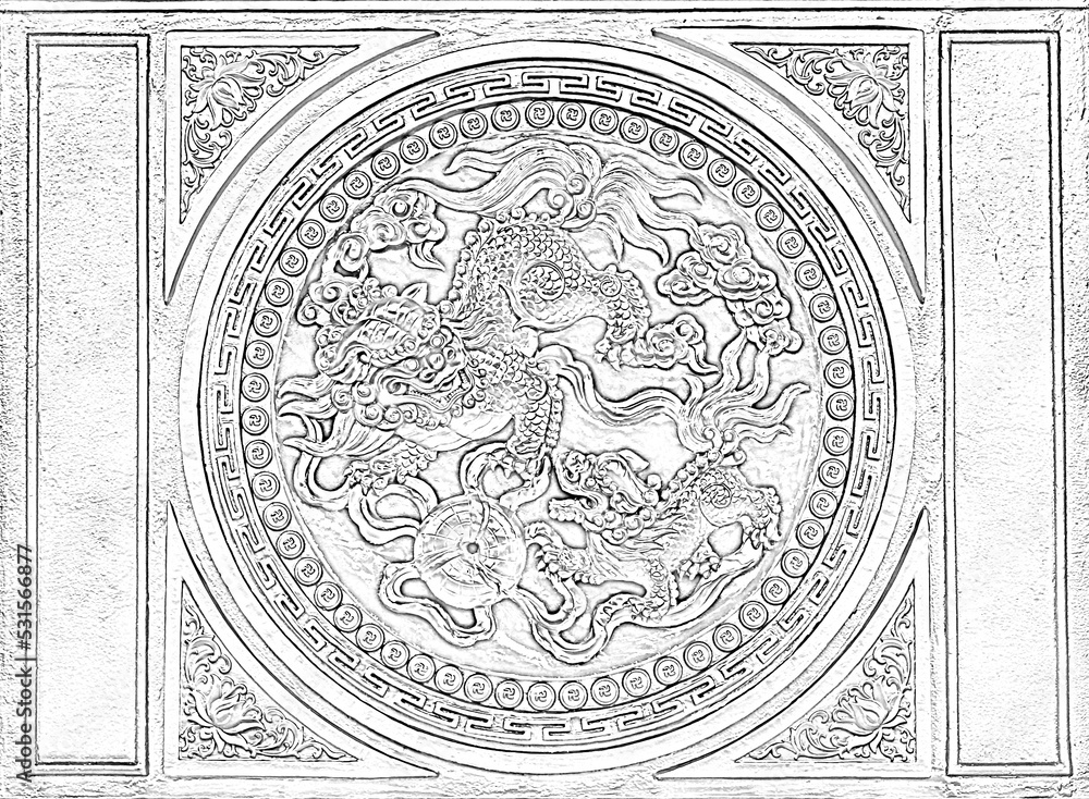 Wall decoration with balck and white dragon sculpture at Golden Temple in Dai Nam on 12 Nov 2016 - Vietnam