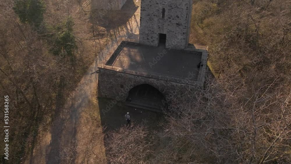Panning Shot Of A Man Exploring The Wetzlar Tower In Stoppelberg Panning Shot Of A Man Exploring The Wetzlar Tower In Stoppelberg