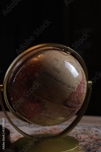 globe on a wooden table
