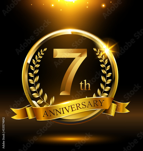 7th golden anniversary logo with ring and ribbon, laurel wreath