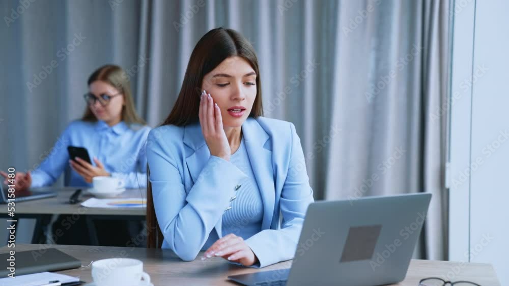 Beautiful business manager working with computer. Succesfull young businesswoman with laptop. Beautiful business manager working with computer. Succesfull young businesswoman with laptop.