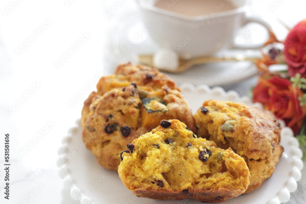 Homemade pumpkin scone and milk tea for autumn breakfast food image Homemade pumpkin scone and milk tea for autumn breakfast food image