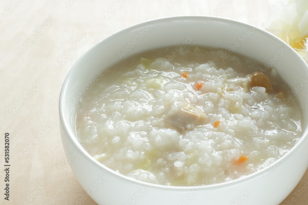 Homemade Chinese food, chicken and carrot congee for comfort food image Homemade Chinese food, chicken and carrot congee for comfort food image