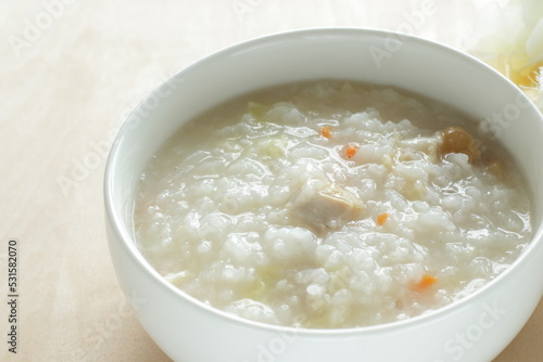 Homemade Chinese food, chicken and carrot congee for comfort food image © jreika
