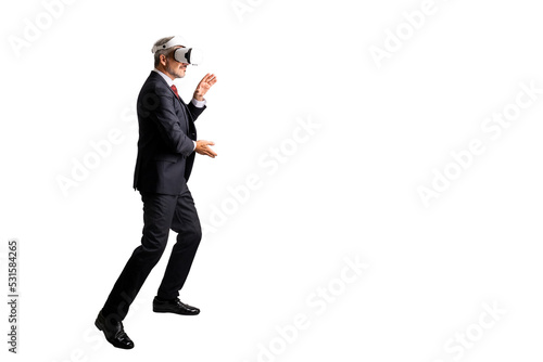 Full length portrait of senior Businessman in elegant blue suit gesturing and using VR headset to training Kungfu martial arts. isolated on white background with copy space.