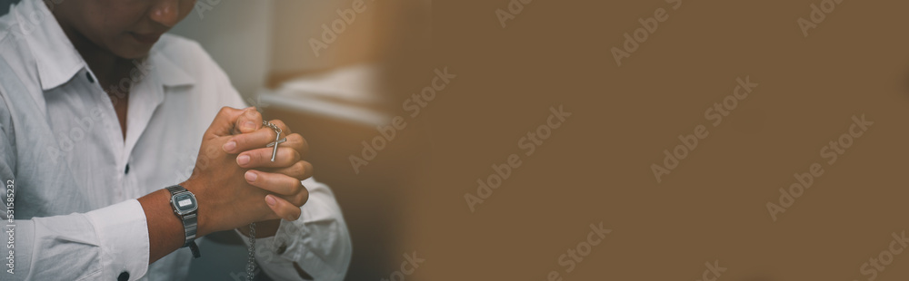 Pray and bible concept. Hand in hand together on bible by woman (worship christian), thinking and closed her eyes at bed room. Person front view, female praying, hope for peace, horizontal banner. Pray and bible concept. Hand in hand together on bible by woman (worship christian), thinking and closed her eyes at bed room. Person front view, female praying, hope for peace, horizontal banner.