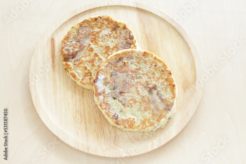 Картината върху платно Japanese frozen food, okonomiyaki on wooden plate