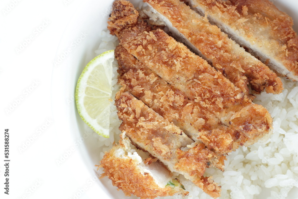 Japanese food, homemade pork cutlet on rice served with Lime