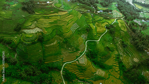 Obraz na płótnie Beautiful mountain landscape, shot from the drone of green rice terraces, Sapa, Vietnam. w salonie