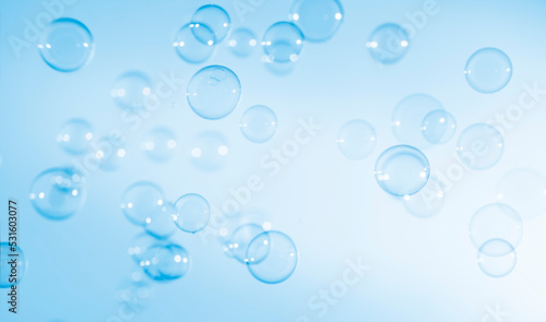 Abstract Transparent Blue Soap Bubbles Background. Soap Sud Bubbles Water.