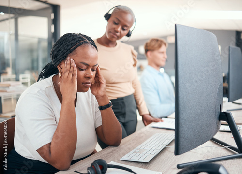 Stress, headache and frustrated in the office from work with exhausted woman at desk. Black businesswoman tired from performance in workplace with overworked, disappointed and upset worker © Mumtaaz D/peopleimages.com