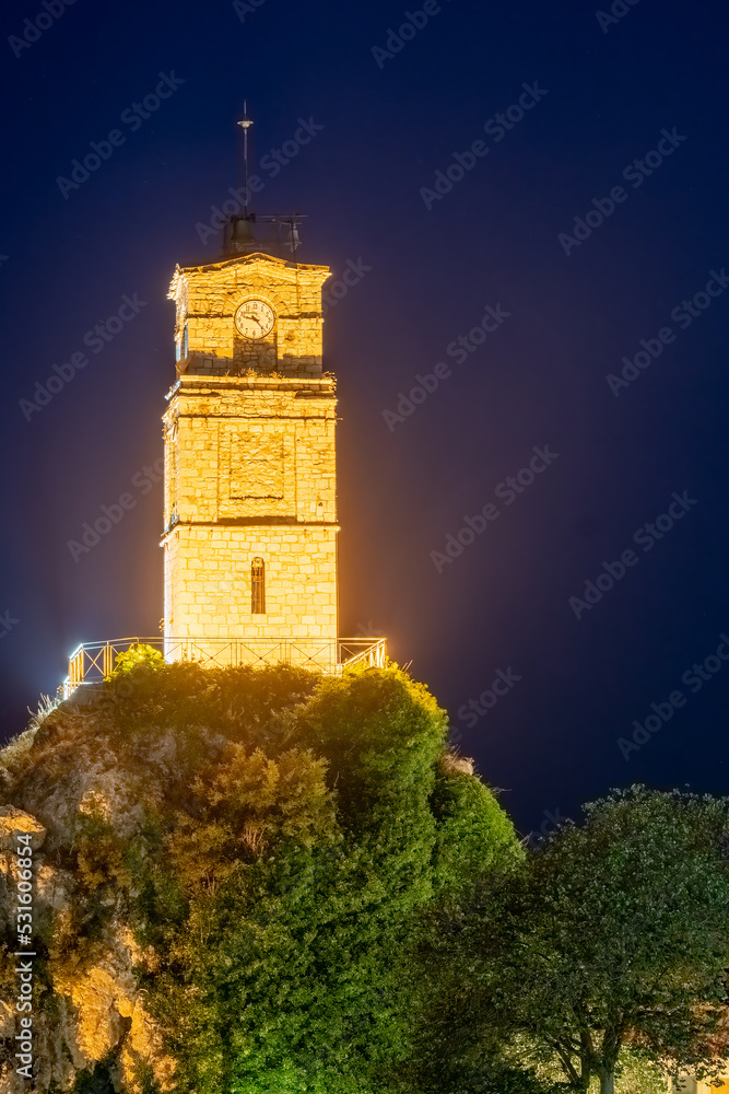 Central clock at Arachova in Greece during night.
