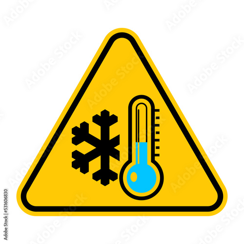 Low temperature warning sign. Vector illustration of yellow triangle sign with snowflake and blue thermometer icon inside. Caution symbol isolated on background. Winter concept. Very cold and freezing