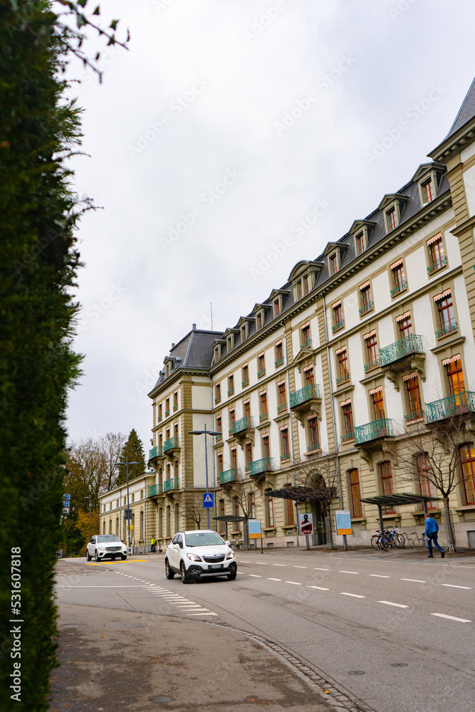 Kunstmuseum near Aare lake and street in old town of Thun during autumn , winter cloudy day : Thun , Switzerland : December 2 , 2019