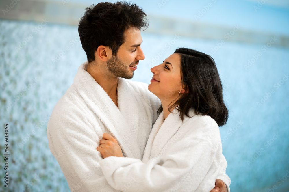 Romantic couple enjoying honeymoon and wellness treatments in a hotel spa Romantic couple enjoying honeymoon and wellness treatments in a hotel spa