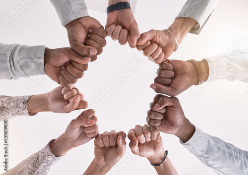 Hands, teamwork and fist for business meeting support, motivation and success of global market strategy startup company. Collaboration, target goal and mission of corporate is diversity and job trust