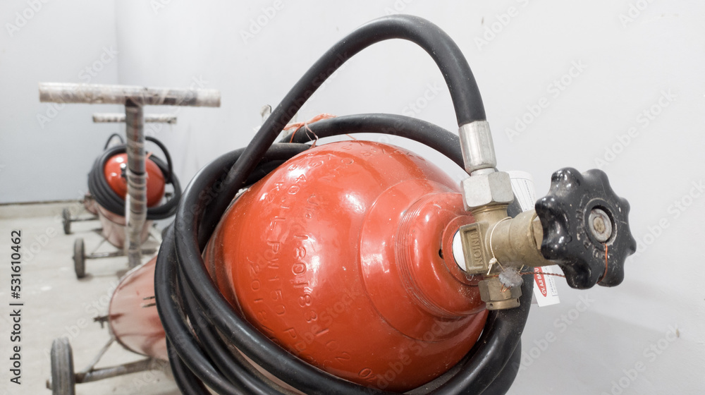 fire extinguisher is available in case of fire emergency in industrial room. fire extinguisher is available in case of fire emergency in industrial room.