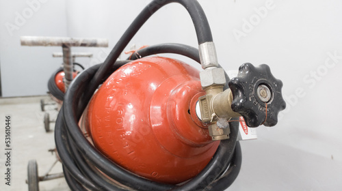 fire extinguisher is available in case of fire emergency in industrial room.