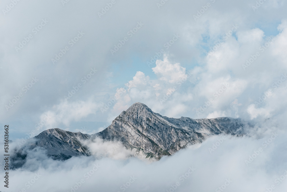 Beautiful view of mountains covered by clouds Beautiful view of mountains covered by clouds
