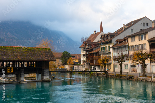 Unterseen , historic and small old town and beautiful square near Interlaken and River Aare during autumn , winter morning : Interlaken , Switzerland : December 3 , 2019 photo