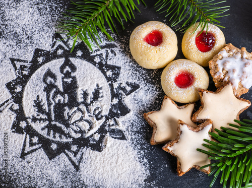 Christmas decorated cinnamon stars and hussars doughnuts photo