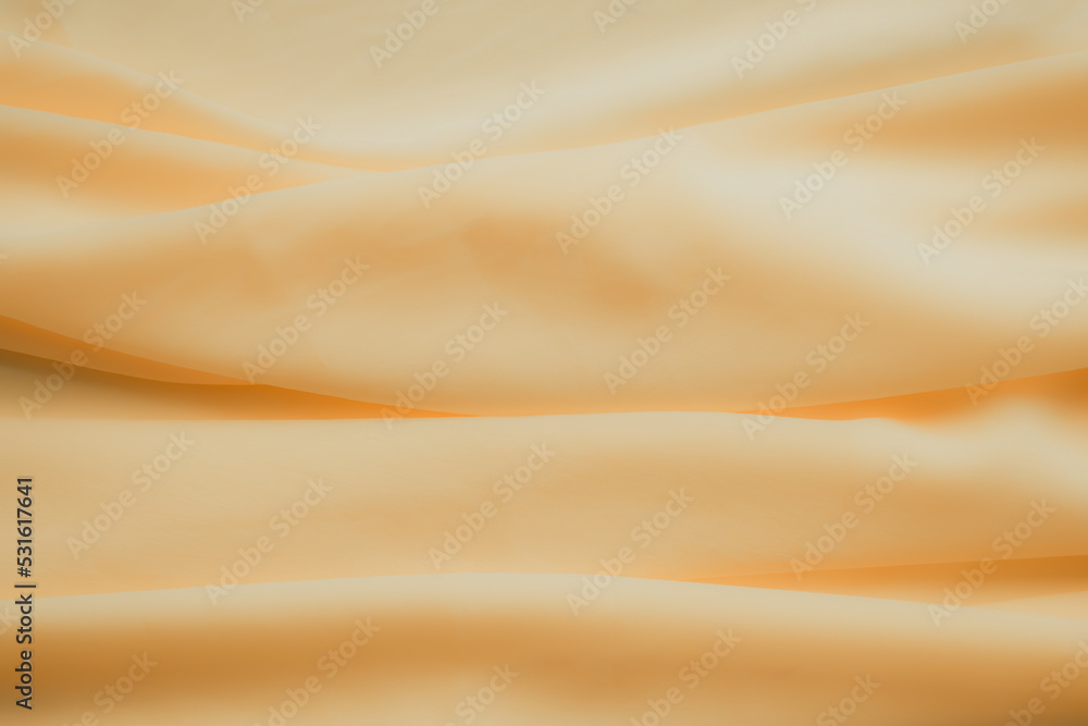 Fototapeta premium Yellow Color Autumn Cloth Pattern Background,Silk Wave Texture Design Backdrop,Card Poster or Banner,Light Gradient Fabric Smooth Shape Colorful,Abstract Luxury Golden Template Wallpaper,free space.