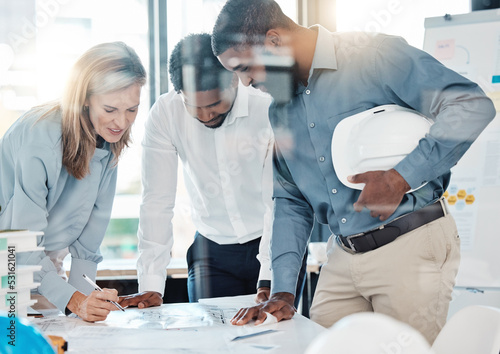 Collaboration, meeting and design with architect in office with blueprint, planning and project management. Engineering, teamwork and architecture with professional designer employees